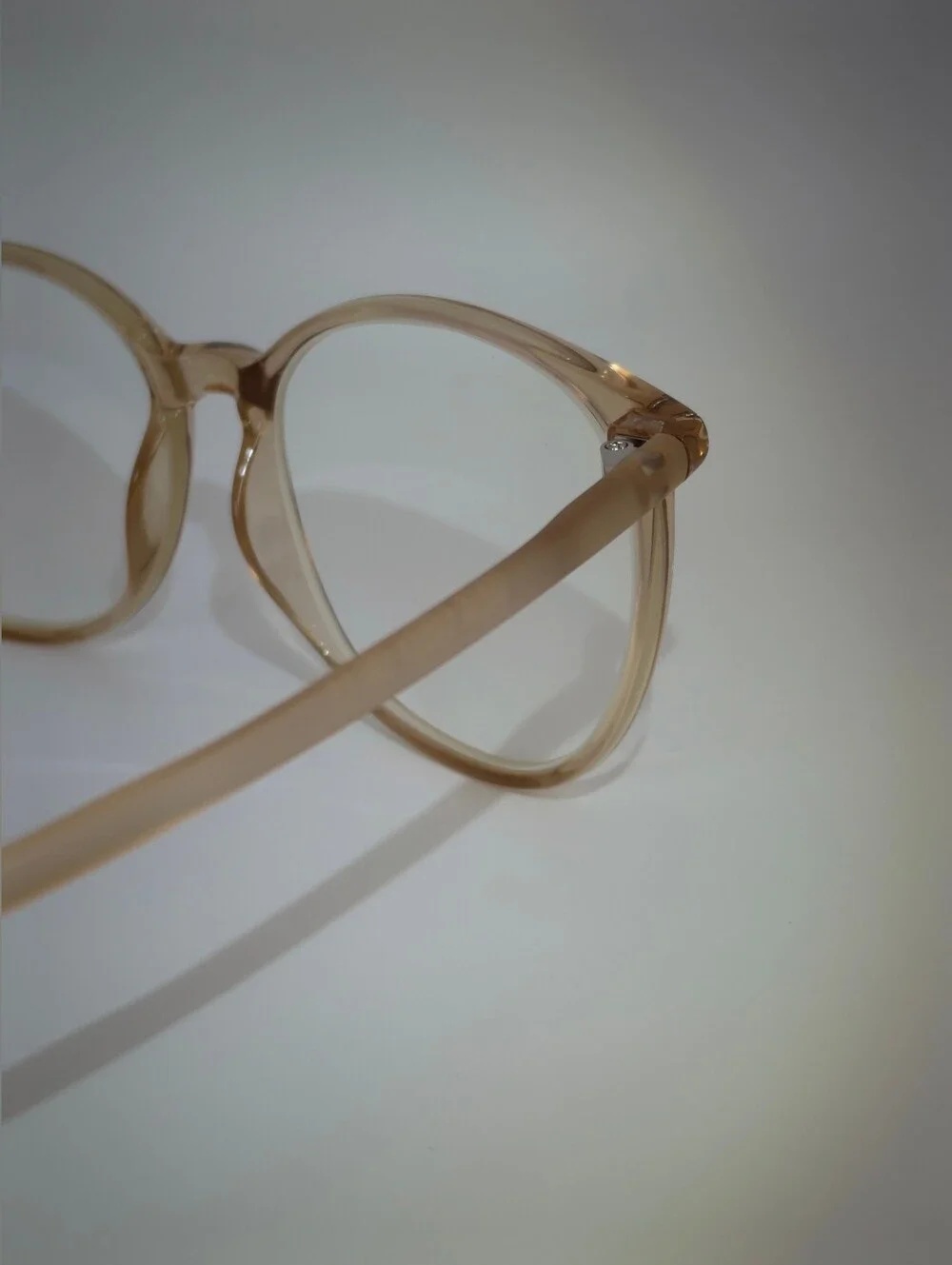 Lucia. Clear Nude Round Frame Glasses. Minimalist Metal.
